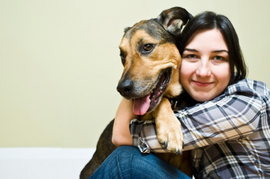 woman-hugging-dog