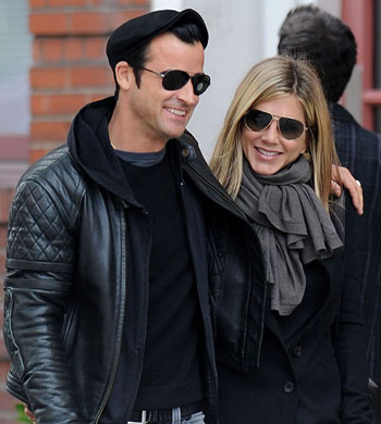#7891808 Bundled up in jackets and scarves, actress Jennifer Aniston and her beau Justin Theroux take a walk in chilly NYC, New York on September 16th, 2011. Fame Pictures, Inc - Santa Monica, CA, USA - +1 (310) 395-0500