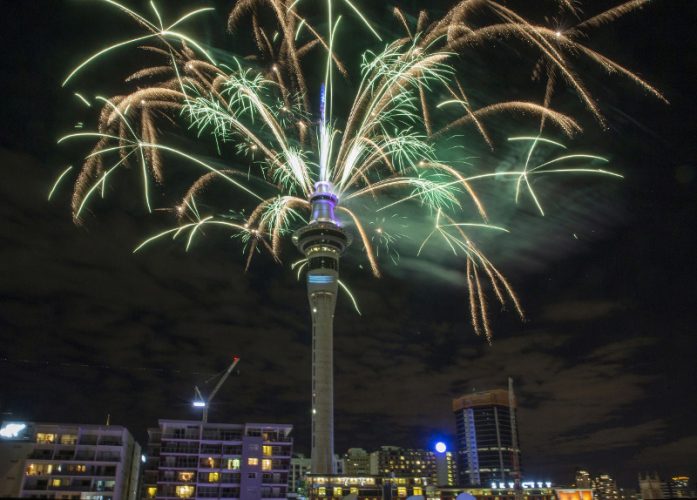 Fireworks explode off Auckland's Skytower as the New Year is welcomed to New Zealand, Jan 1, 2017. (Peter Meecham/New Zealand Herald via AP)